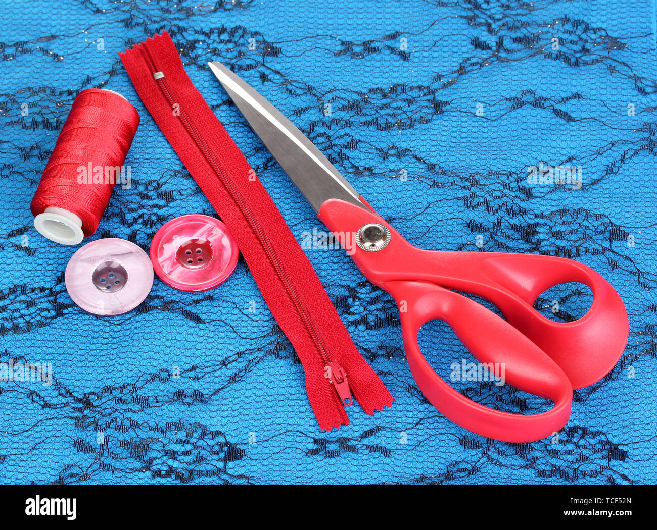 Sewing accessories on fabric Stock Photo Alamy