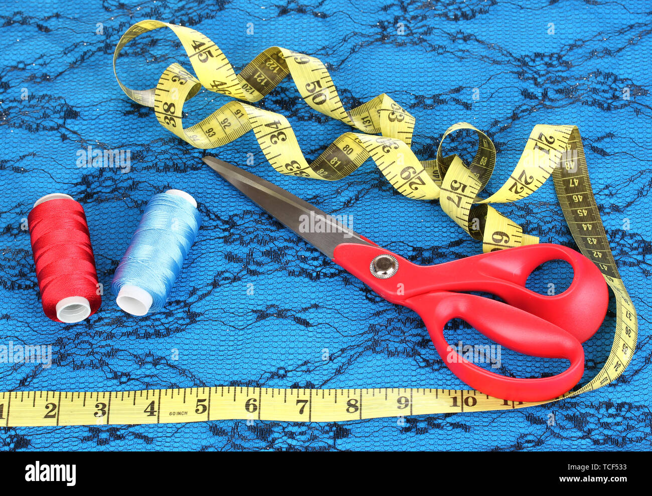 Sewing accessories on fabric Stock Photo Alamy