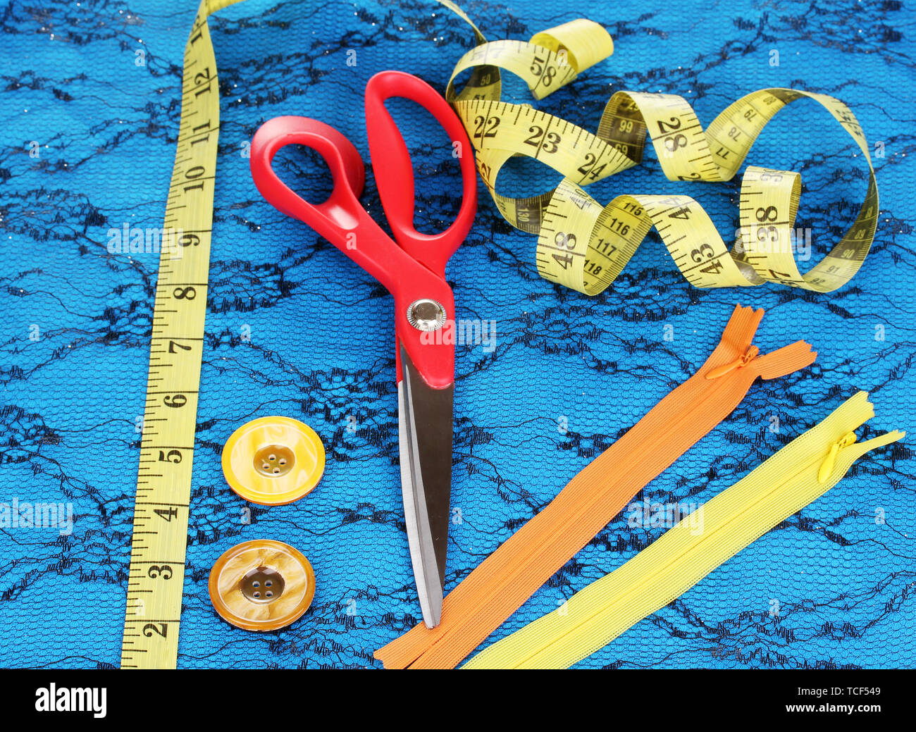 Sewing accessories on fabric Stock Photo Alamy