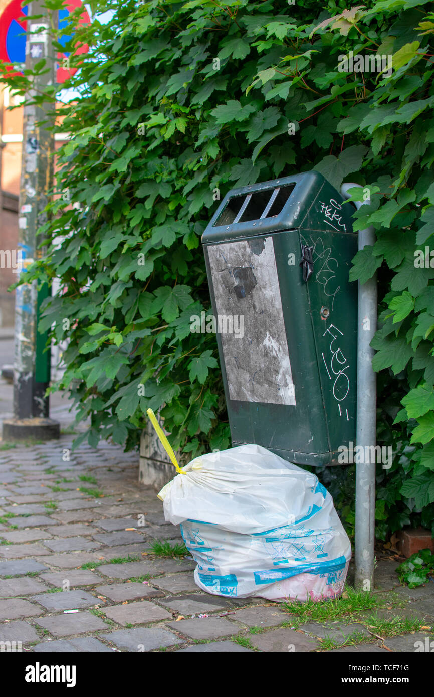 Brussels, Belgium June 1 2019 White brussels trash bag next to a