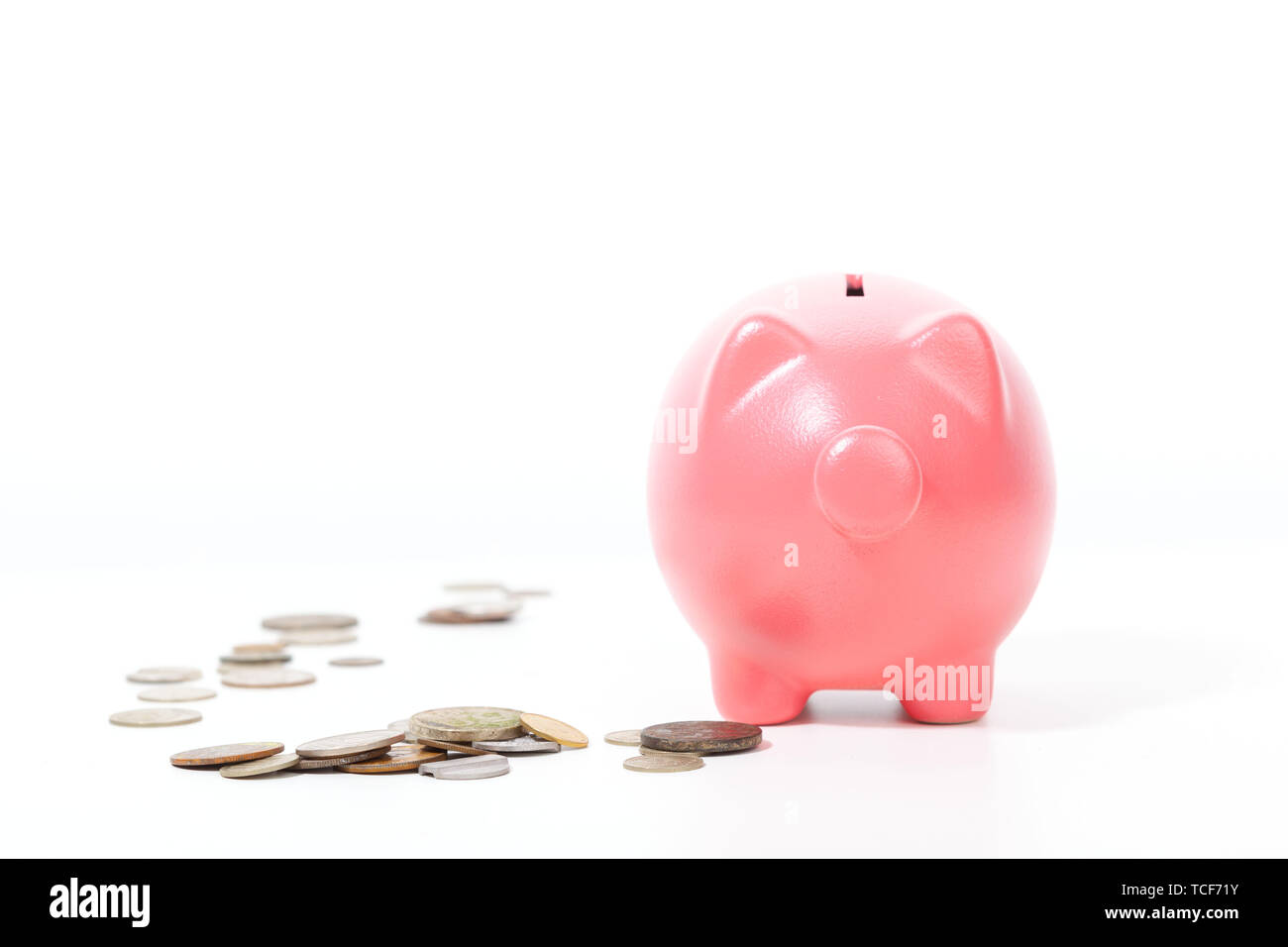 Piggy bank isolated on white background Stock Photo - Alamy