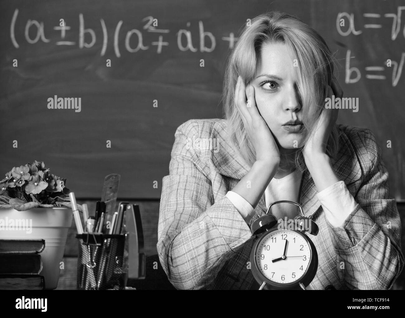 time is gone. teacher with alarm clock at blackboard. Time. Back to