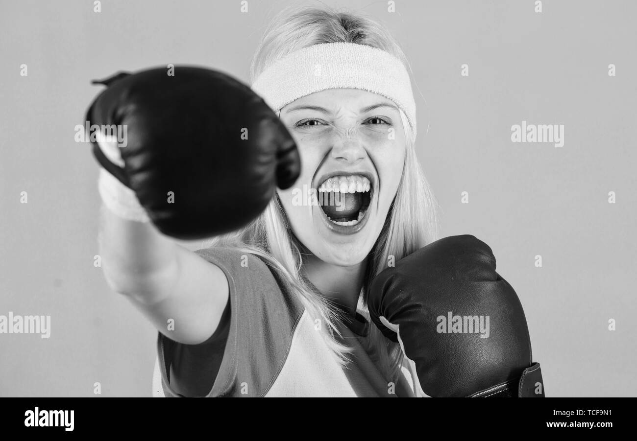 Cardio boxing exercises to lose weight. Woman exercising with boxing