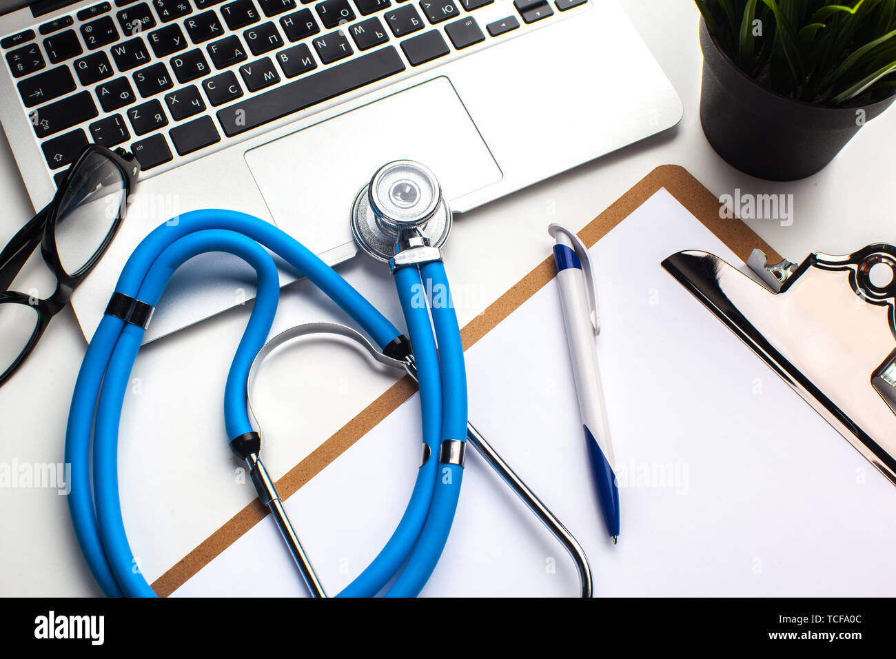 Medical stethoscope on computer keyboard Stock Photo - Alamy