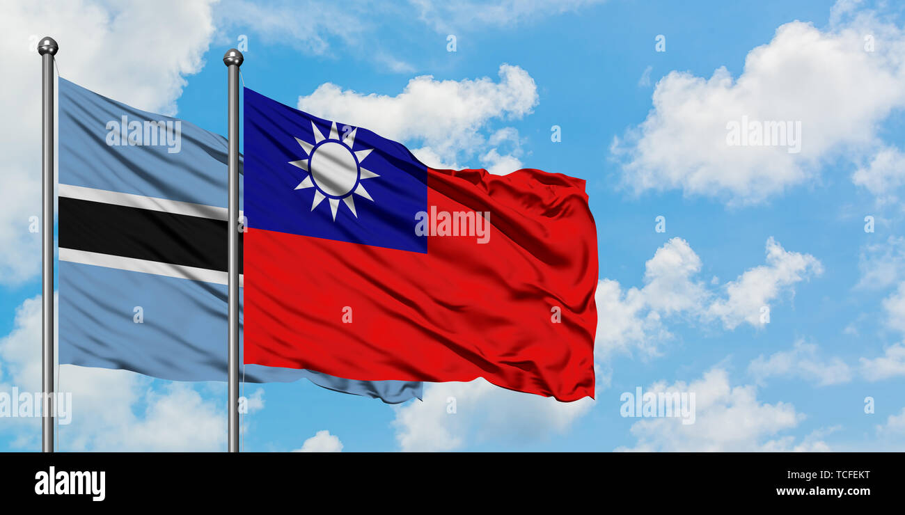 Botswana and Taiwan flag waving in the wind against white cloudy blue ...