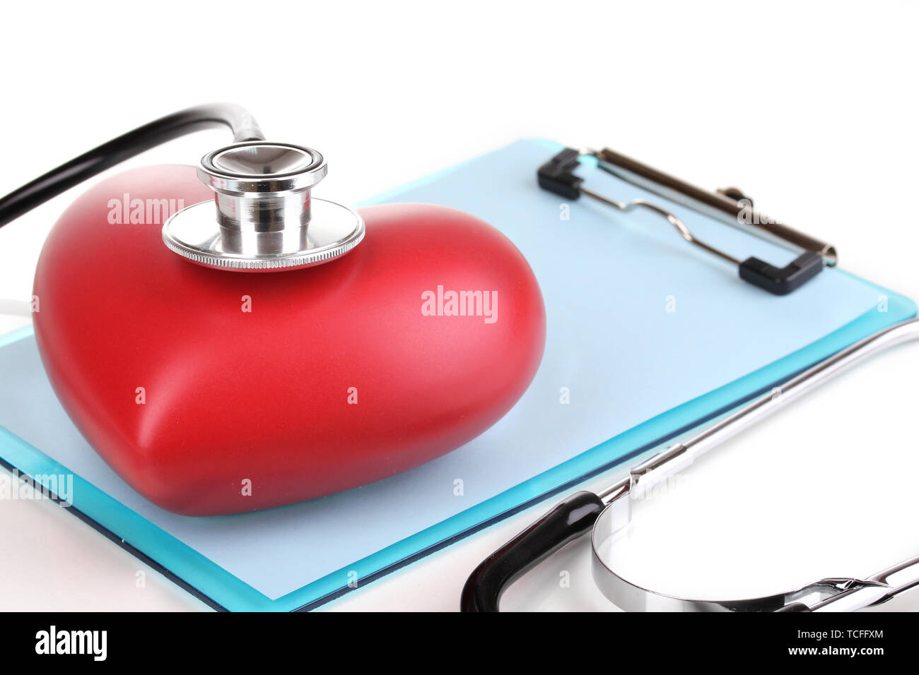 Stethoscope, heart and blank clipboard close-up isolated on white Stock ...