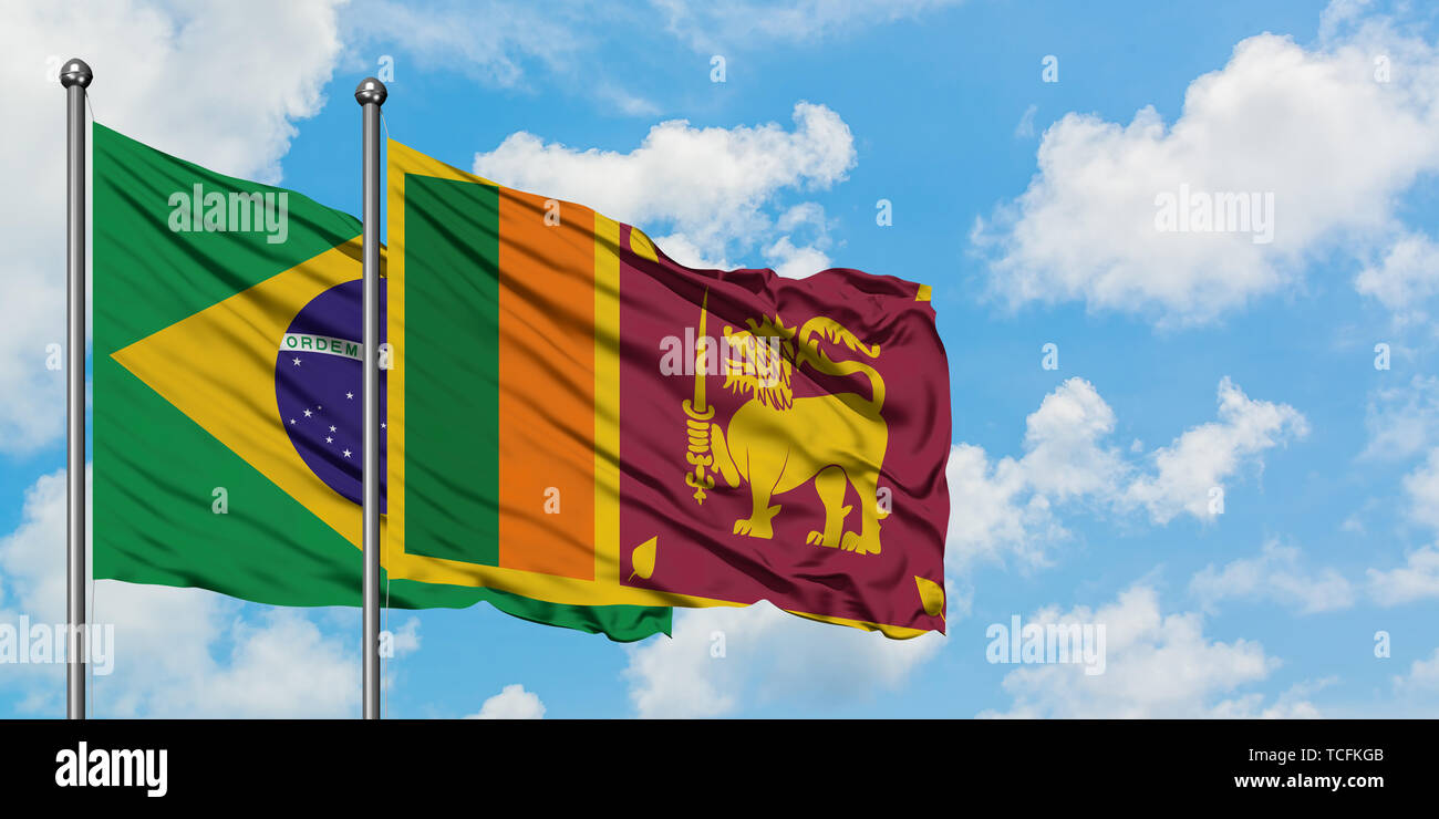 Brazil and Sri Lanka flag waving in the wind against white cloudy blue ...