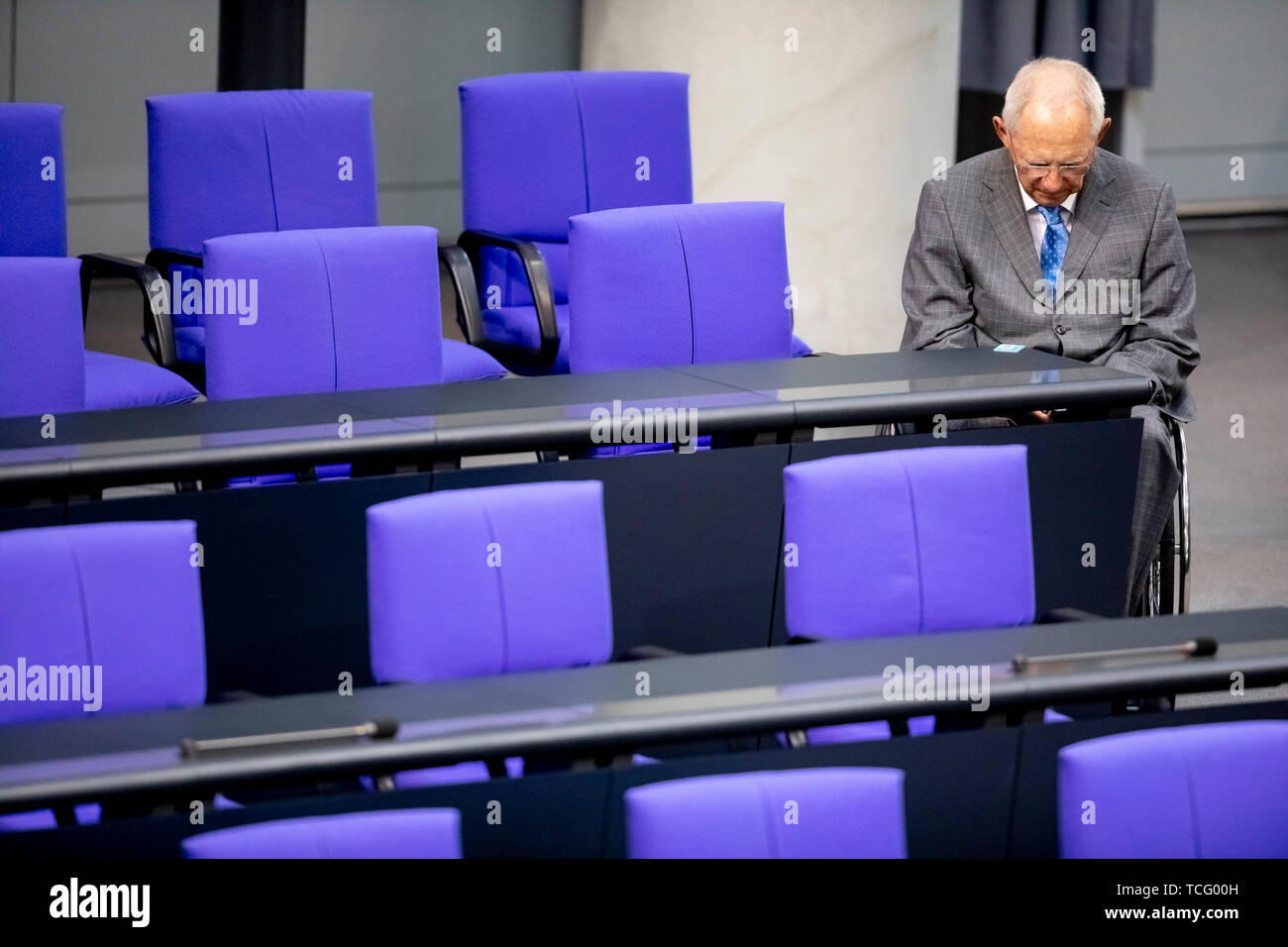 Berlin, Germany. 07th June, 2019. Wolfgang Schäuble (CDU), President of the German Bundestag, sits with his head bowed in the plenary hall of the Bundestag. The agenda includes votes on asylum and residence law, the Immigration of Experts Act and the Employment Promotion Act for Foreign Nationals. Credit: Christoph Soeder/dpa/Alamy Live News Stock Photo