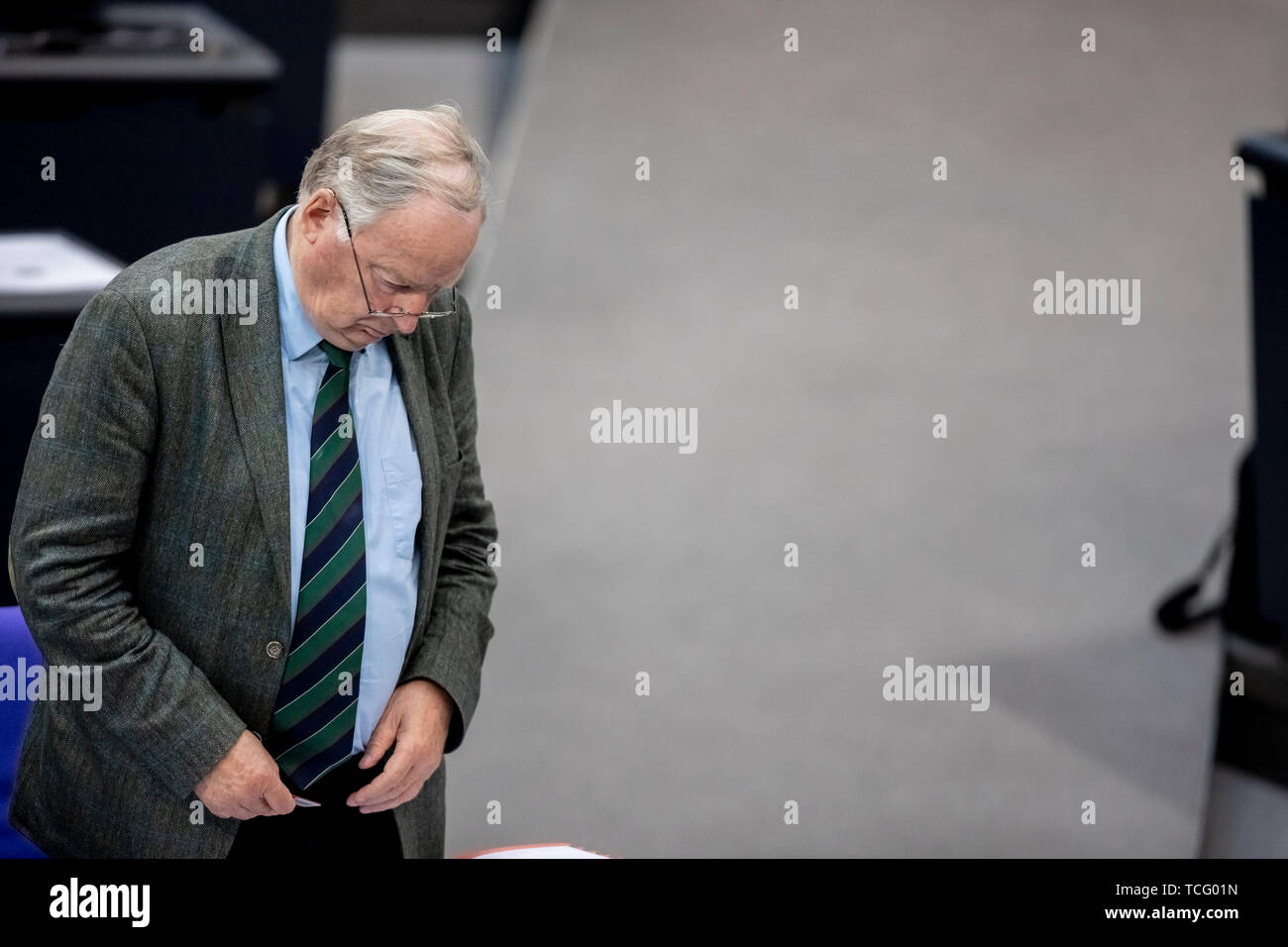 Berlin, Germany. 07th June, 2019. Alexander Gauland, chairman of the AfD parliamentary group, stands with his head bowed in the plenary hall of the Bundestag. The agenda includes votes on asylum and residence law, the Immigration of Experts Act and the Employment Promotion Act for Foreign Nationals. Credit: Christoph Soeder/dpa/Alamy Live News Stock Photo