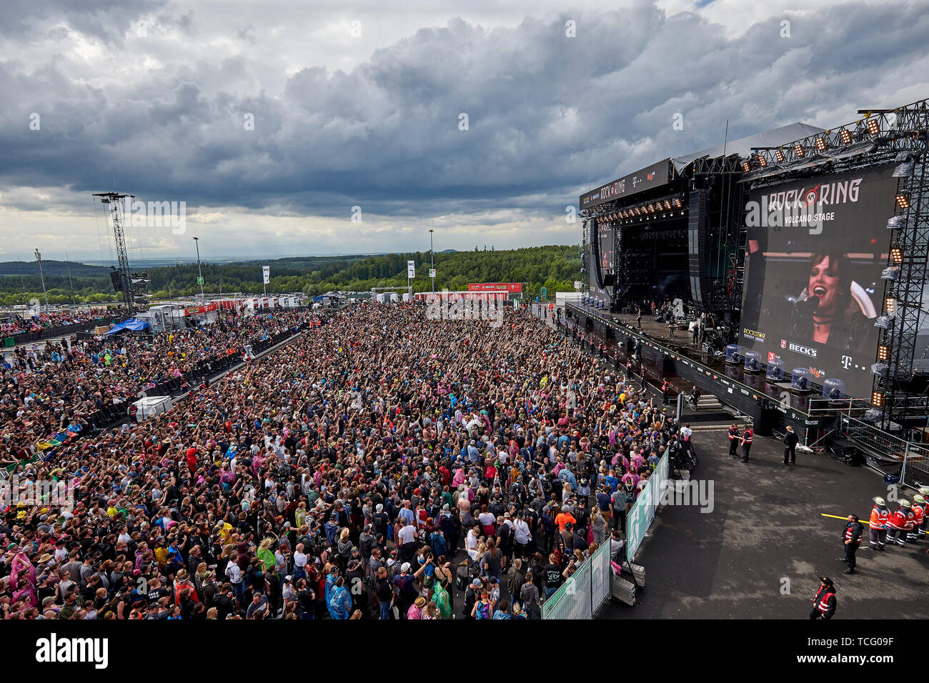 Nurburg, Germany. 07th June, 2019. Rock fans crowd at the open-air festival  "Rock am Ring" during the performance of the band "Halestorm" in front of  the main stage. On three days about