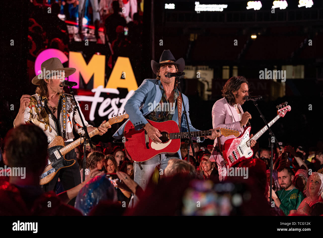 NASHVILLE, TENNESSEE - JUNE 06: Cameron Duddy, Mark Wystrach and Jess Carson of Midland perform on stage during day 1 of 2019 CMA Music Festival on June 06, 2019 in Nashville, Tennessee. Photo: Andrew Wendowski for imageSPACE/MediaPunch Stock Photo