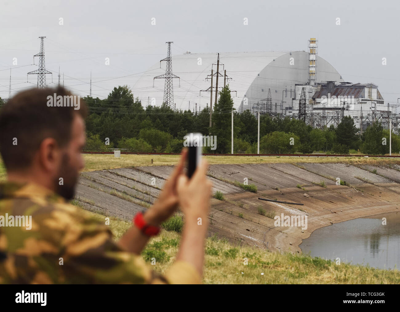 Kiev, Ukraine. 7th June, 2019. A visitor takes a photo in front the New ...