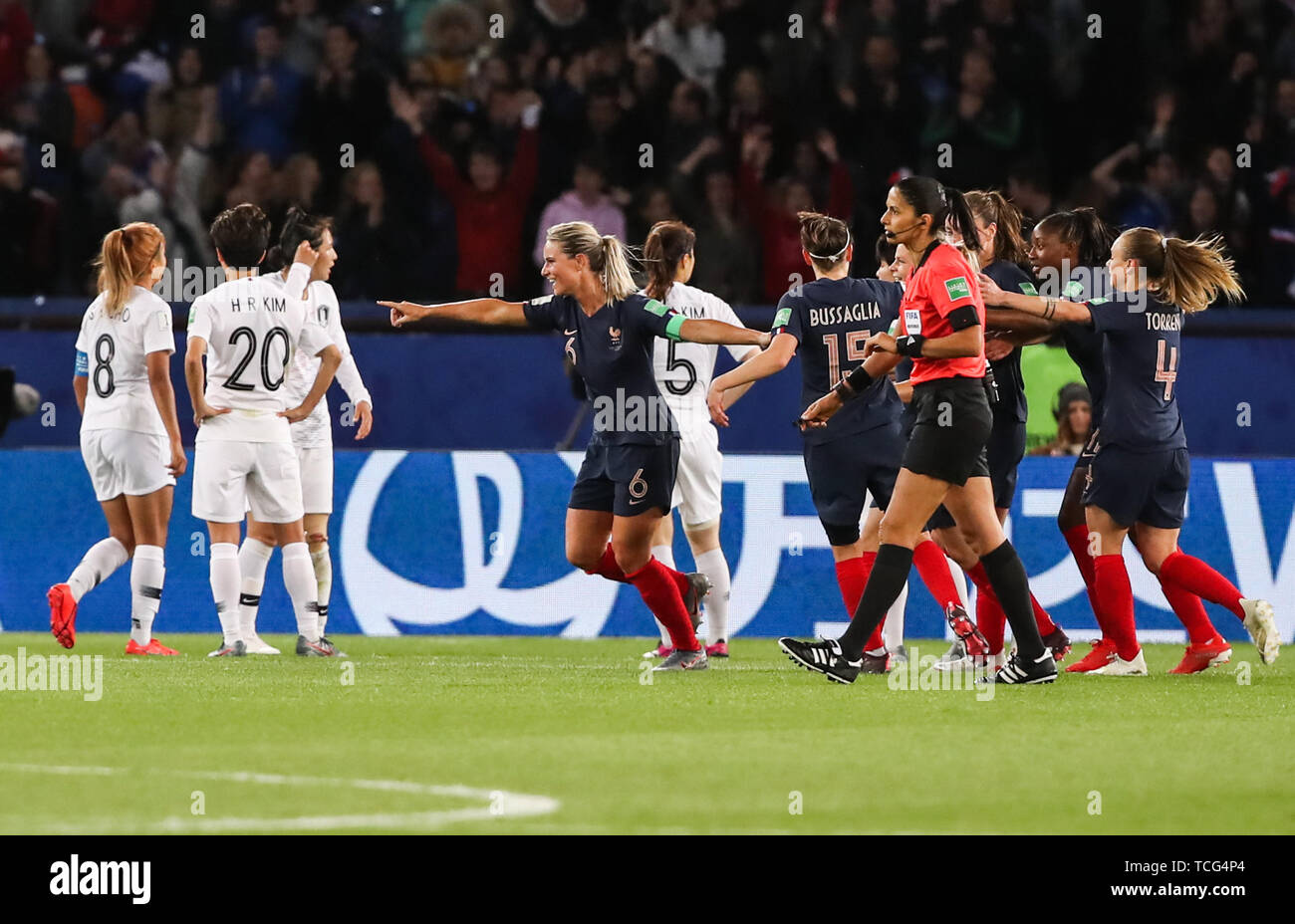 Paris, France. 7th June, 2019. Amandine Henry (4th L) of France celebrates scoring during the opening match between France and South Korea at the 2019 FIFA Women's World Cup in Paris, France, on June 7, 2019. France won 4-0. Credit: Shan Yuqi/Xinhua/Alamy Live News Stock Photo