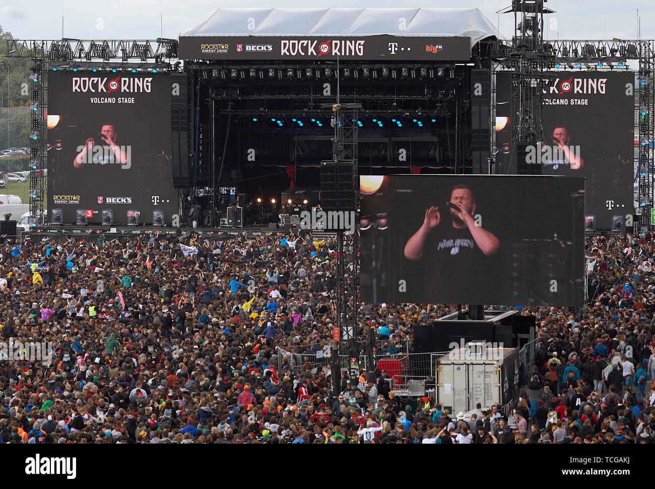 Nürburg, Germany, 08th June, 2019. Rock fans crowd during the performance  of the band "Feine Sahne Fischfilet" in front of the main stage of the  open-air festival "Rock am Ring". On three