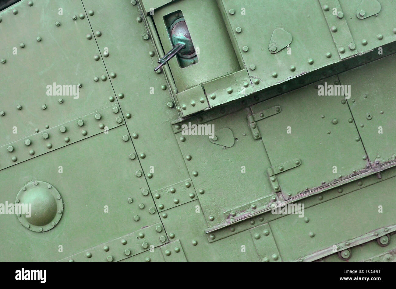 Abstract green industrial metal textured background with rivets and ...