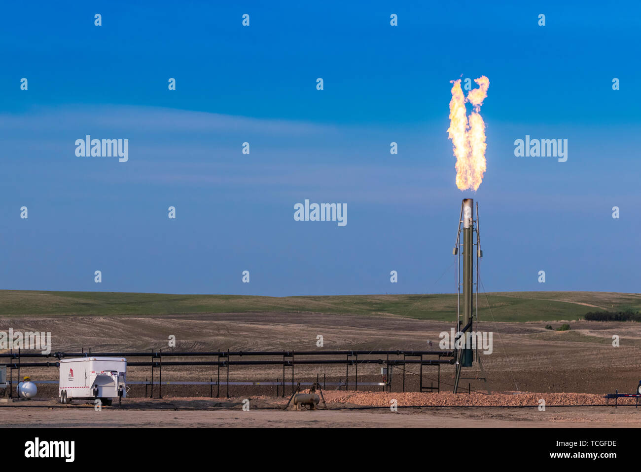 Flaring of natural gas in the Bakken Play oil fields near Williston, North Dakota, USA. Stock Photo