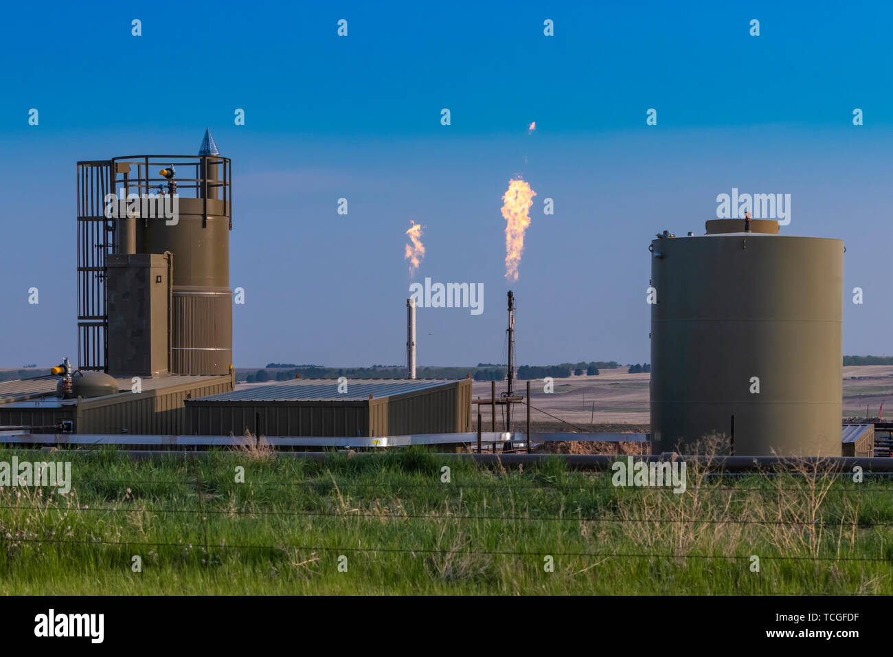 Flaring of natural gas in the Bakken Play oil fields near Williston, North Dakota, USA. Stock Photo