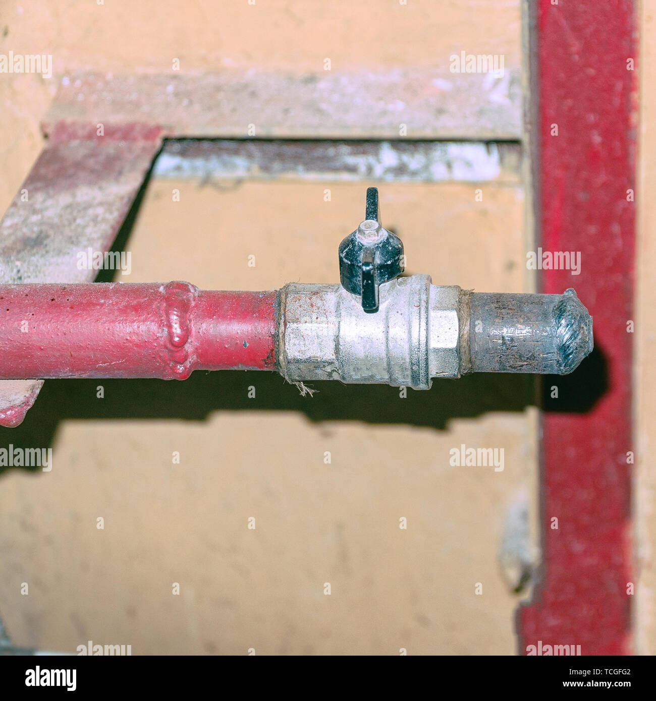 Tap the plug on a metal pipe Stock Photo Alamy