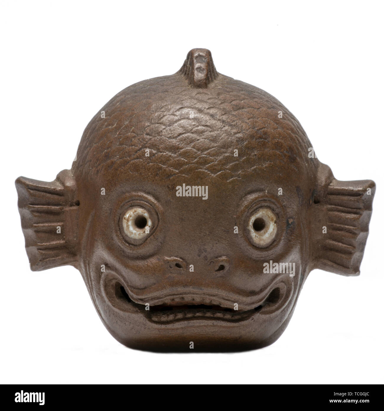 Antique carved Japanese Noh masks with white background Stock Photo