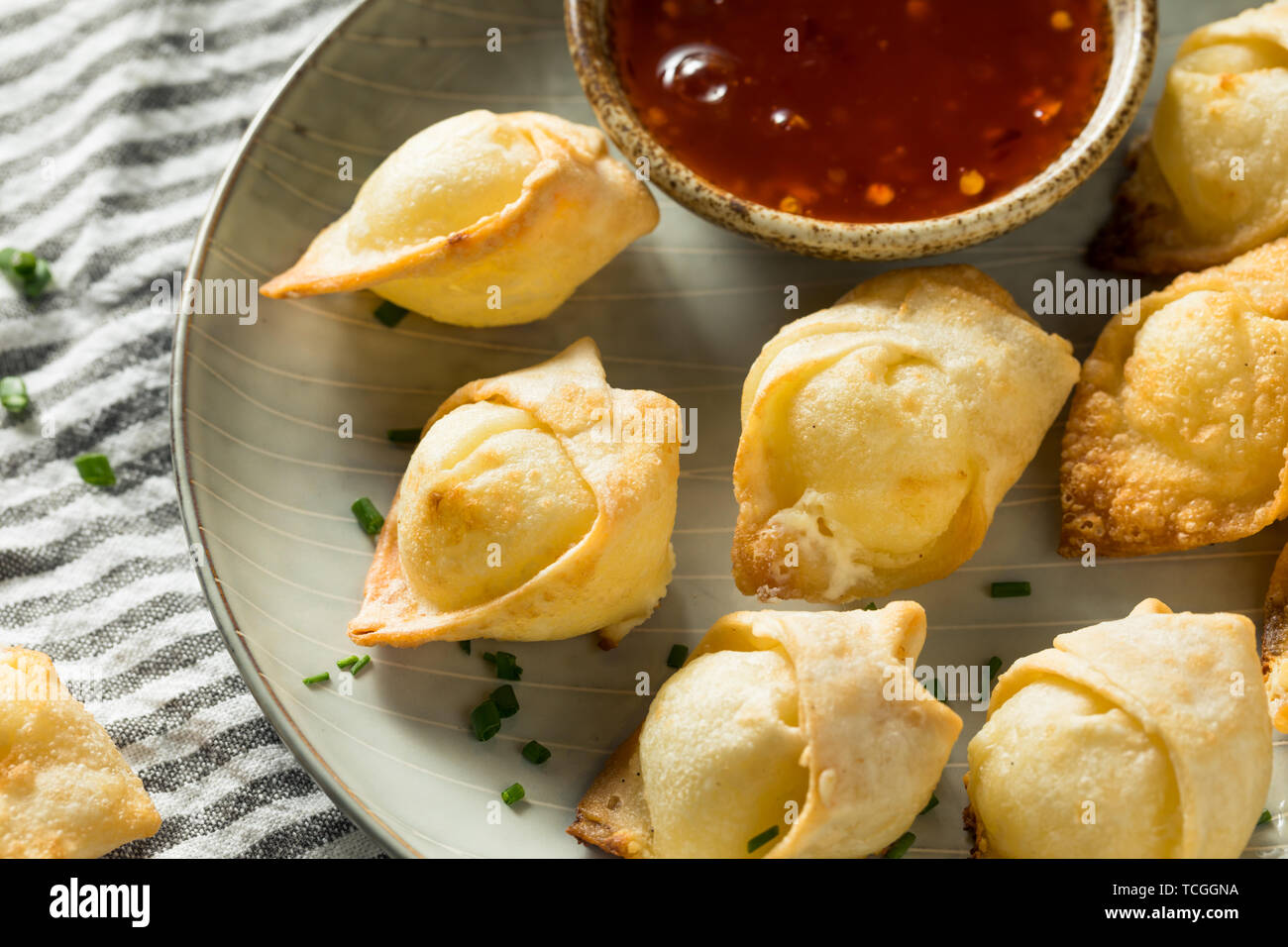 Chinese Cream Cheese Wontons with Sweet and Sour Sauce Stock Photo Alamy