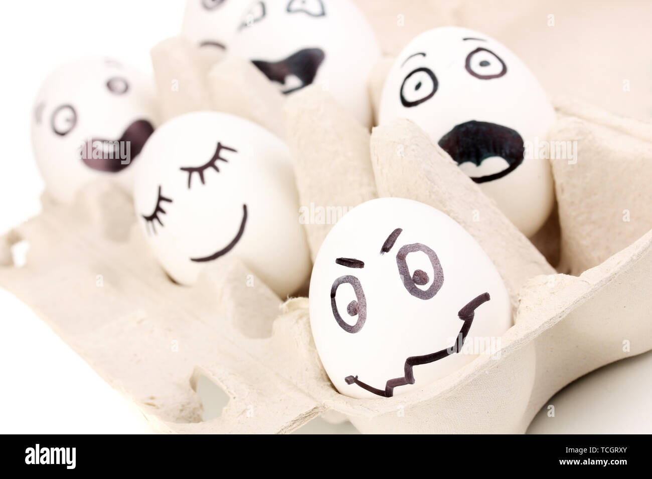 White eggs with funny faces Stock Photo - Alamy