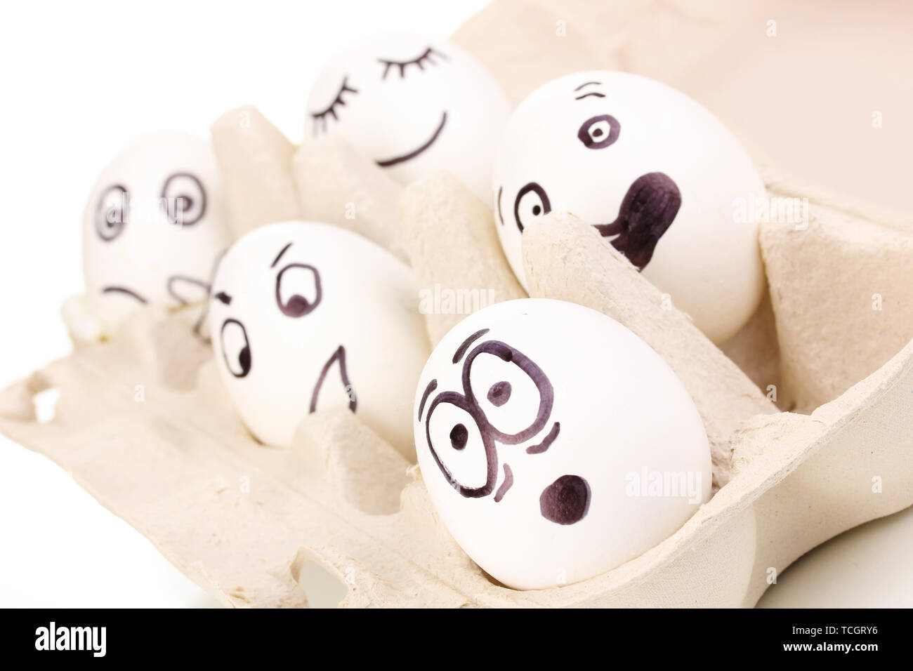 White eggs with funny faces Stock Photo - Alamy