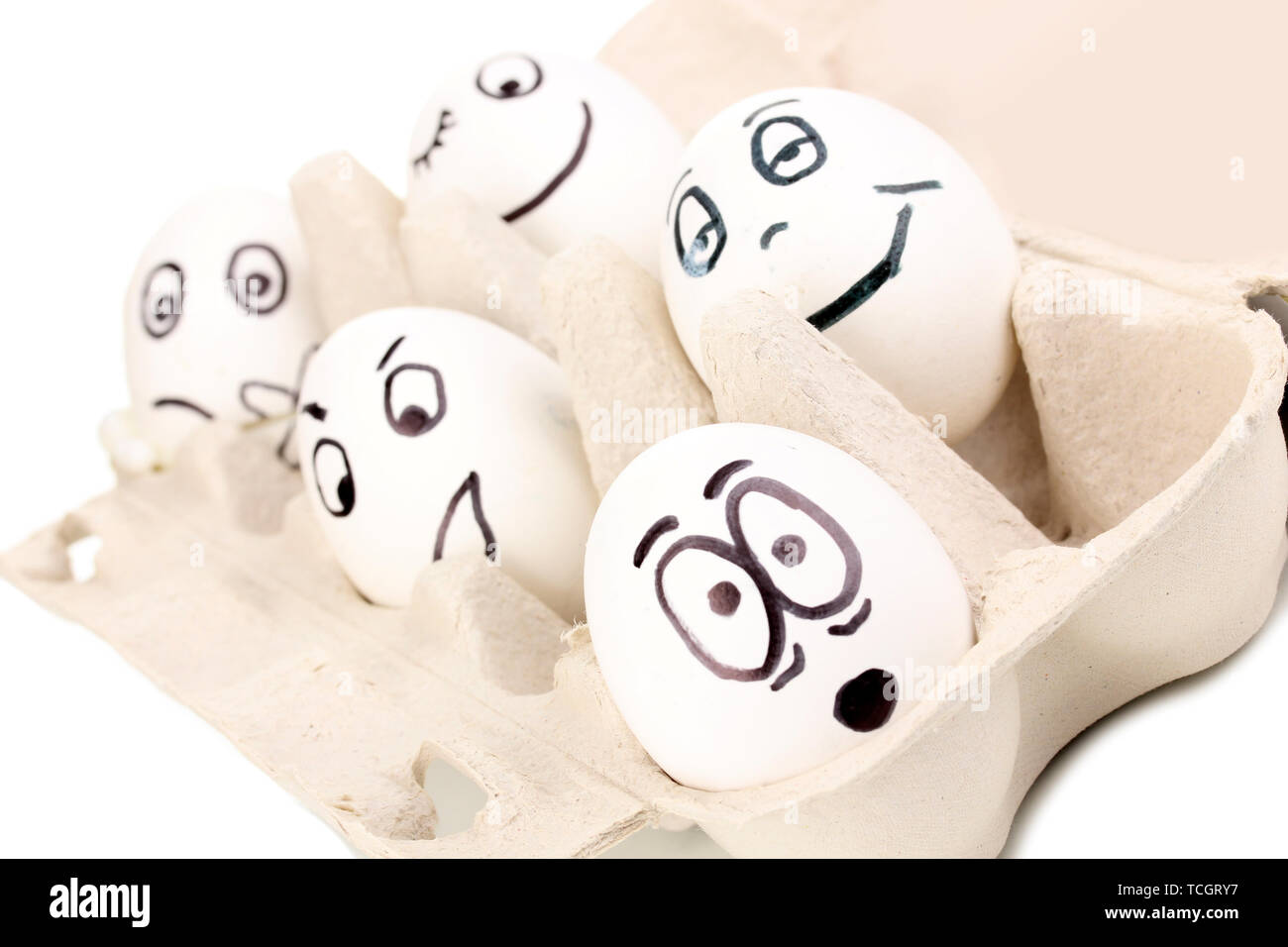 White eggs with funny faces Stock Photo - Alamy