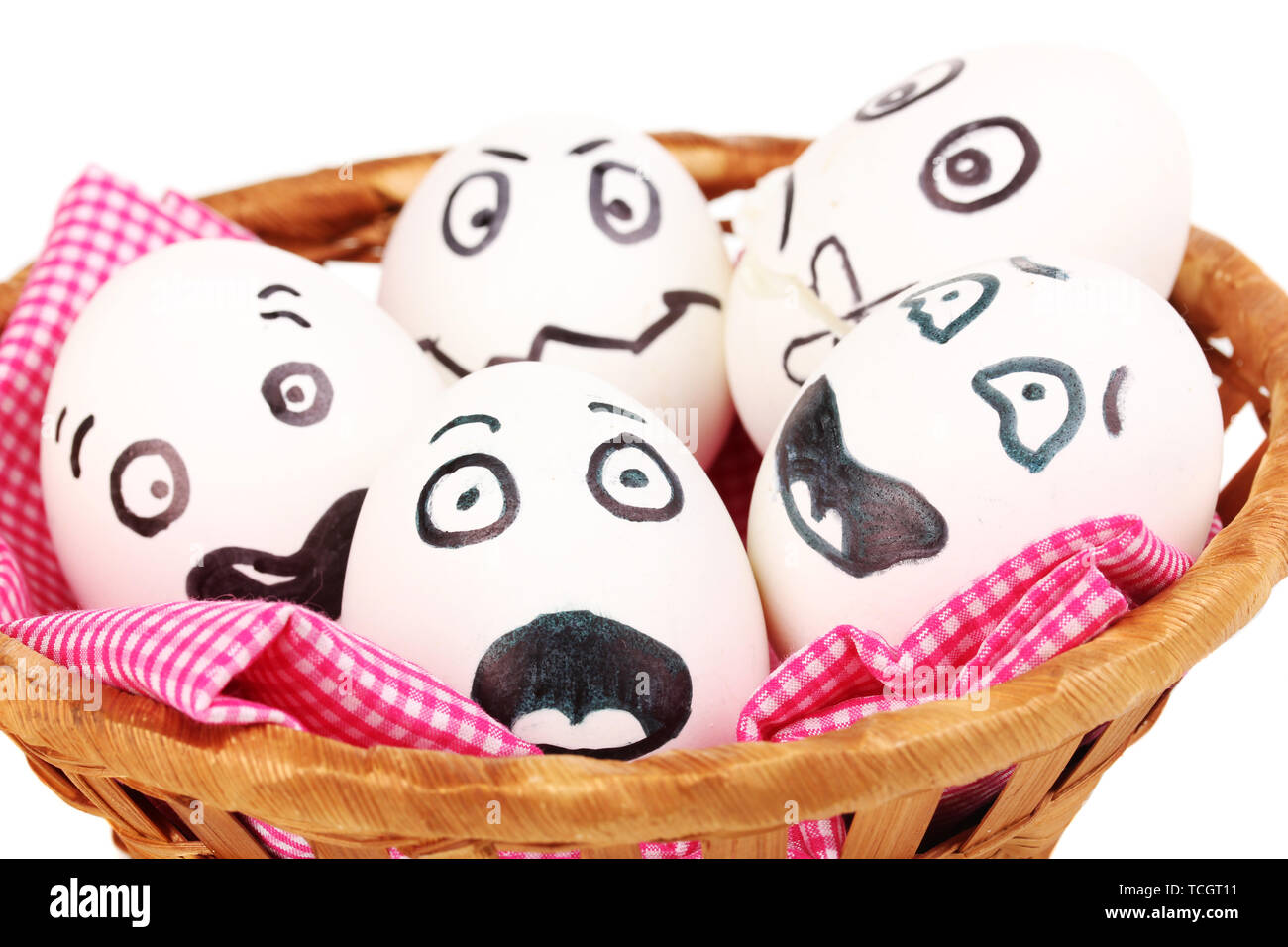 White eggs with funny faces in basket isolated on white Stock Photo - Alamy