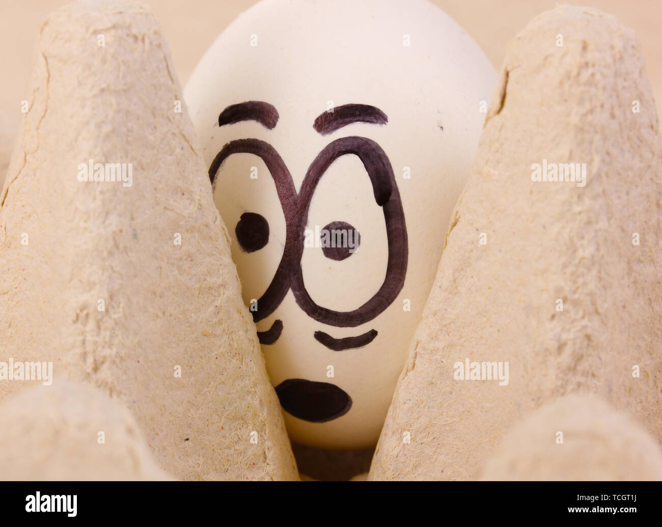 White egg with funny face Stock Photo - Alamy