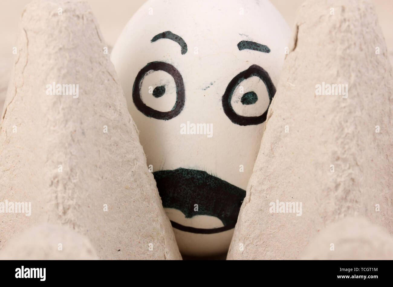 White egg with funny face Stock Photo - Alamy