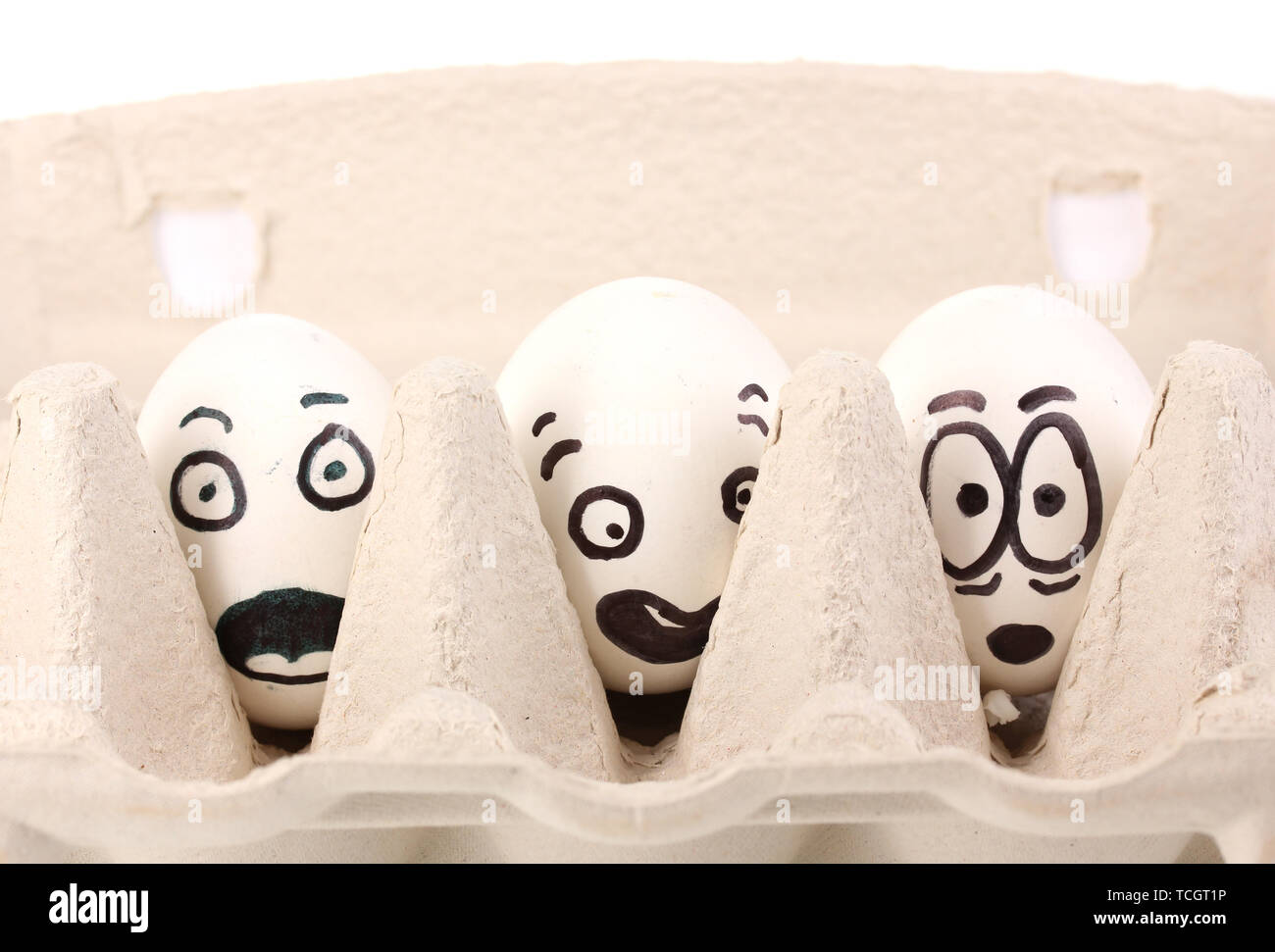 White eggs with funny faces Stock Photo - Alamy