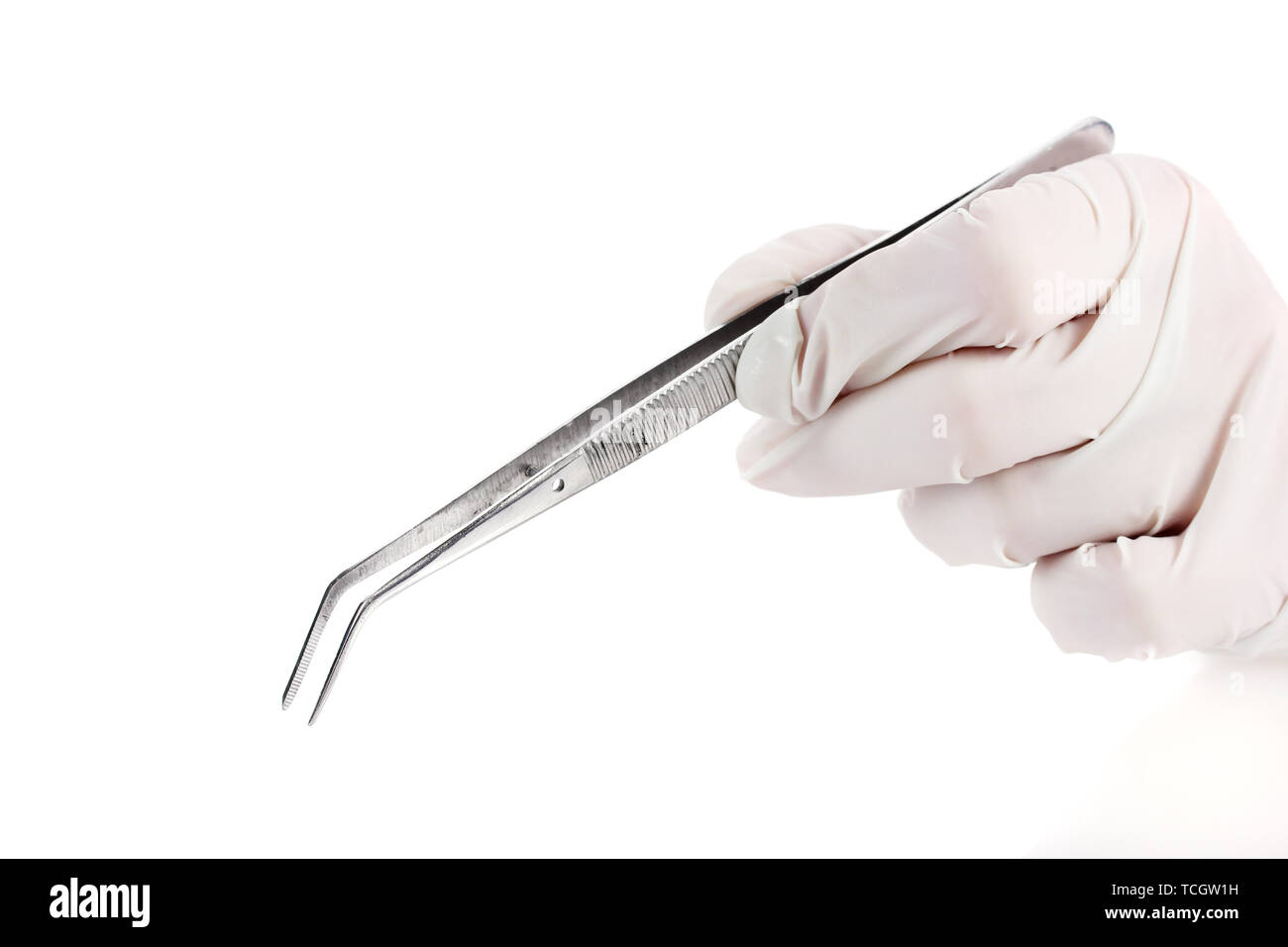 Medical tweezers in hand isolated on white Stock Photo Alamy