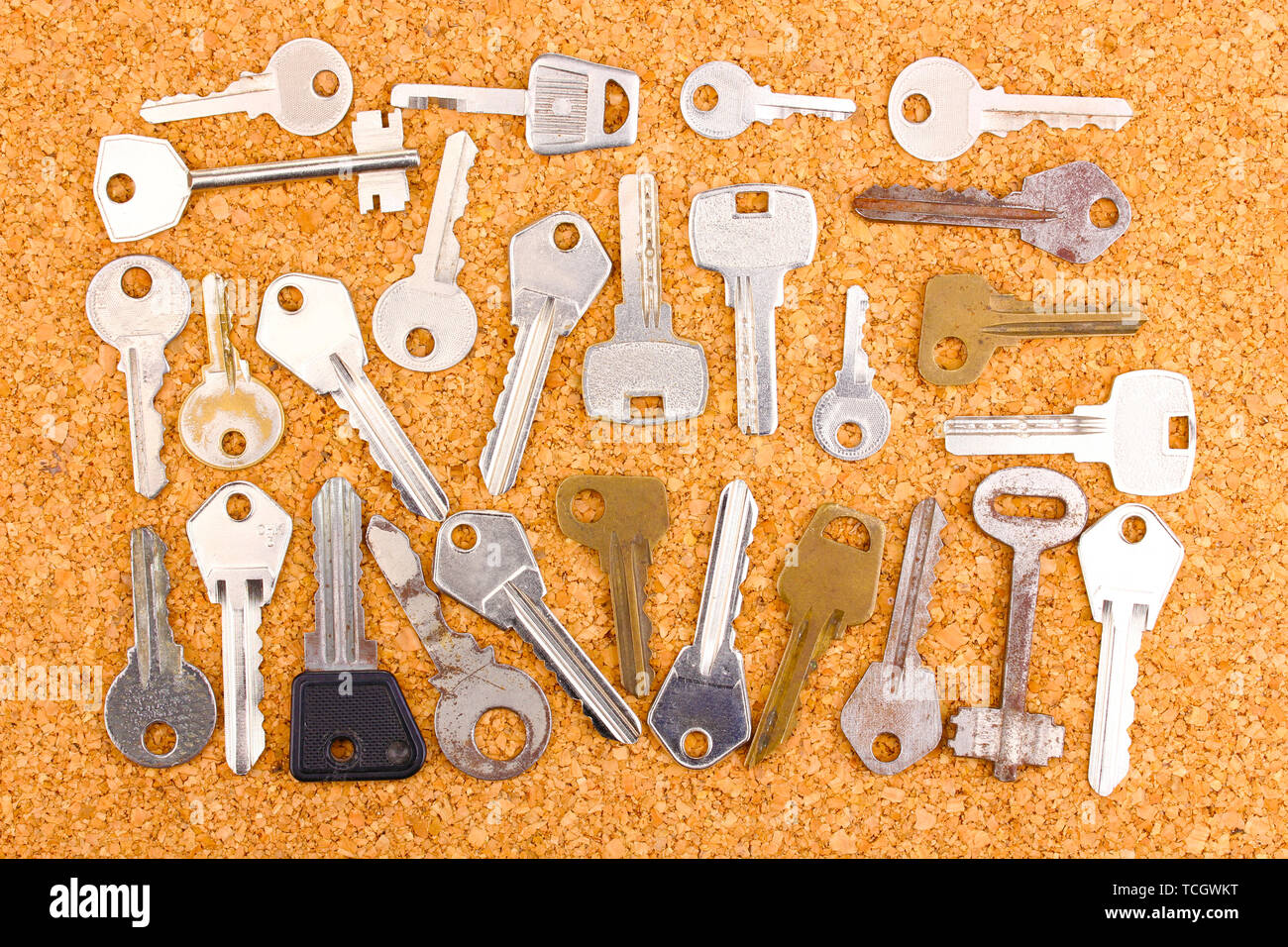 Keys on cork background Stock Photo