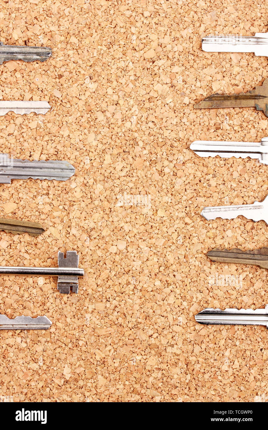 Keys on cork background Stock Photo