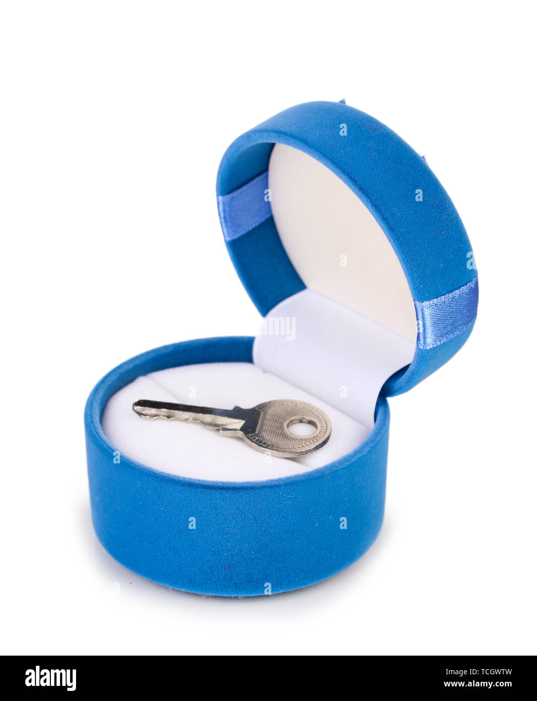 Key in box isolated on white Stock Photo - Alamy
