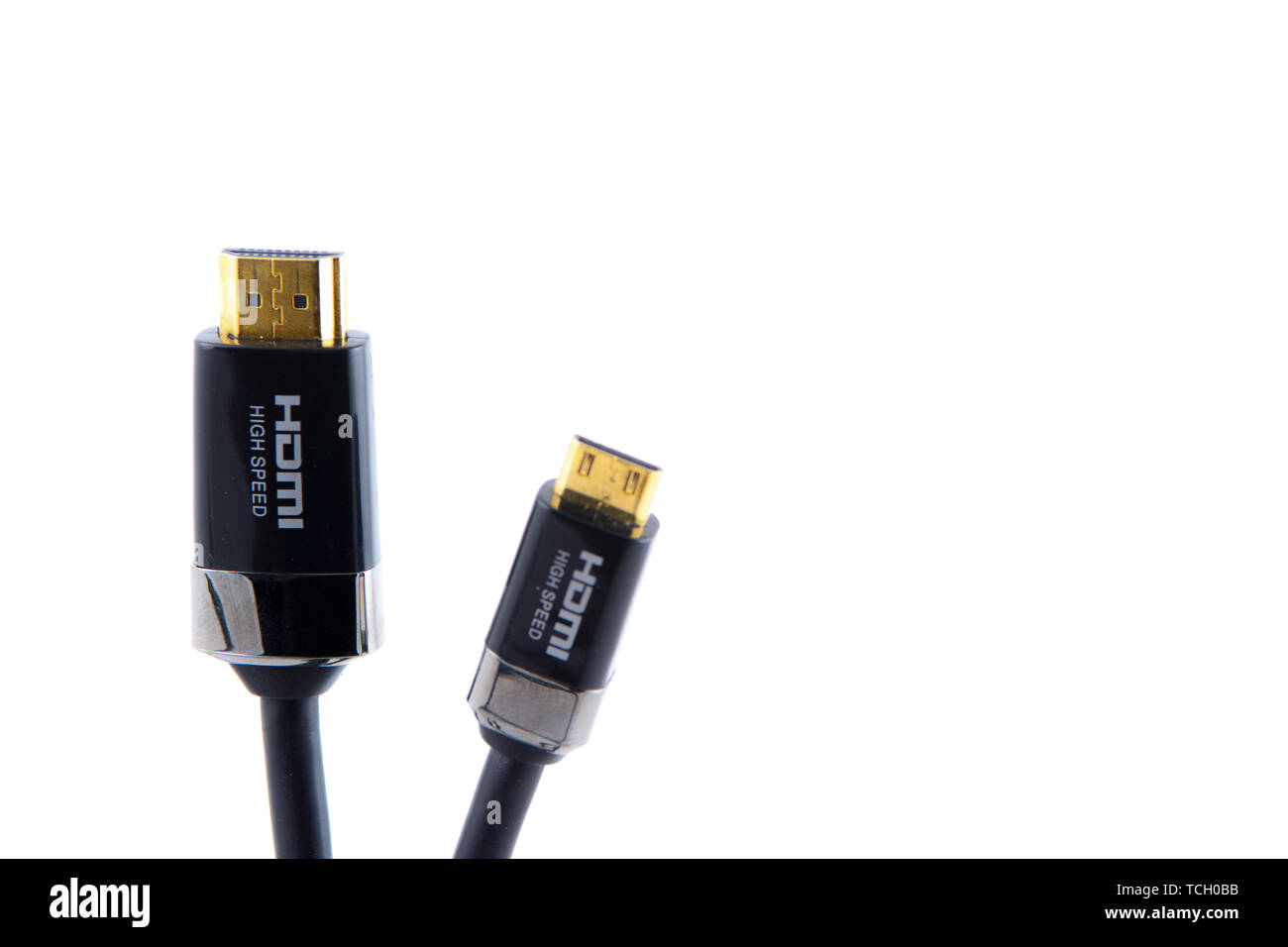 HDMI cables both normal and mini next to eachother with a white