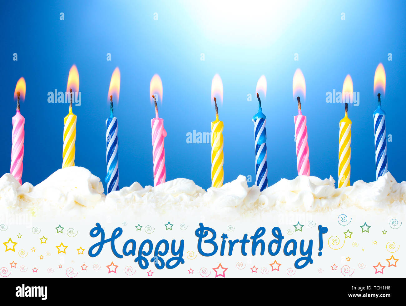 beautiful birthday candles on blue background Stock Photo - Alamy