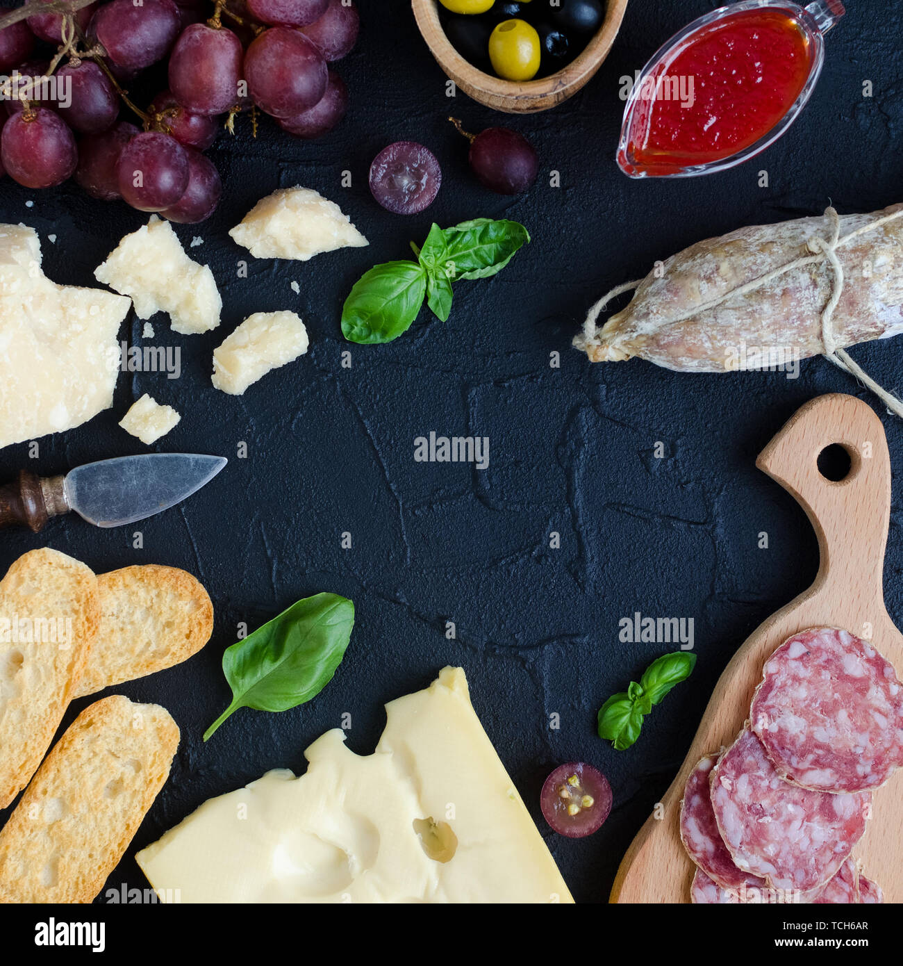 Table full of mediterranean appetizers, tapas or antipasti. Assorted ...