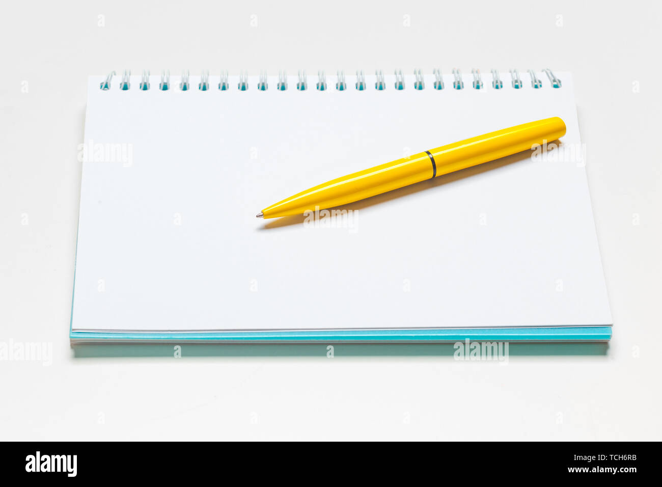 notepad notebook and ball pont pen isolated on white background Stock ...