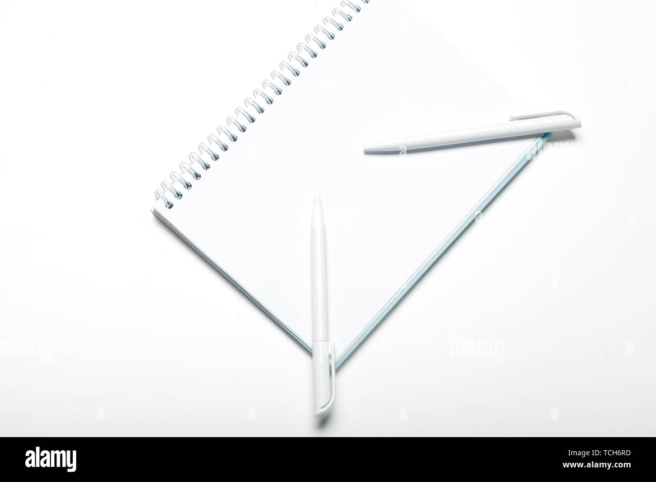notepad notebook and ball pont pen isolated on white background Stock ...