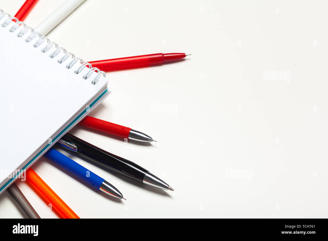 notepad notebook and ball pont pen isolated on white background Stock ...