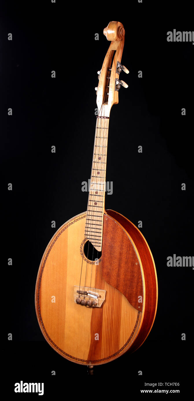 Retro kobza- Ukrainian musical instrument on black background Stock Photo