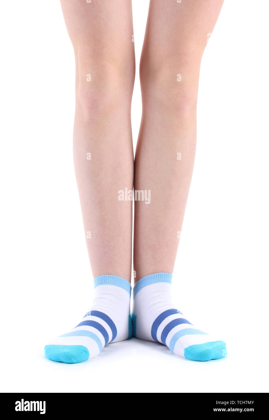 female legs in striped socks isolated on white Stock Photo