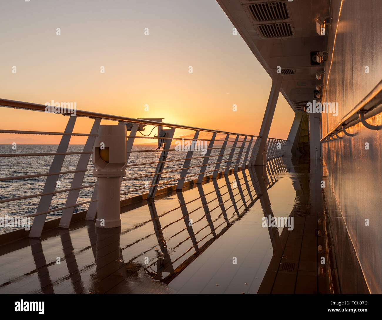 Cruise ship sailing the seas at sunrise or dawn Stock Photo - Alamy