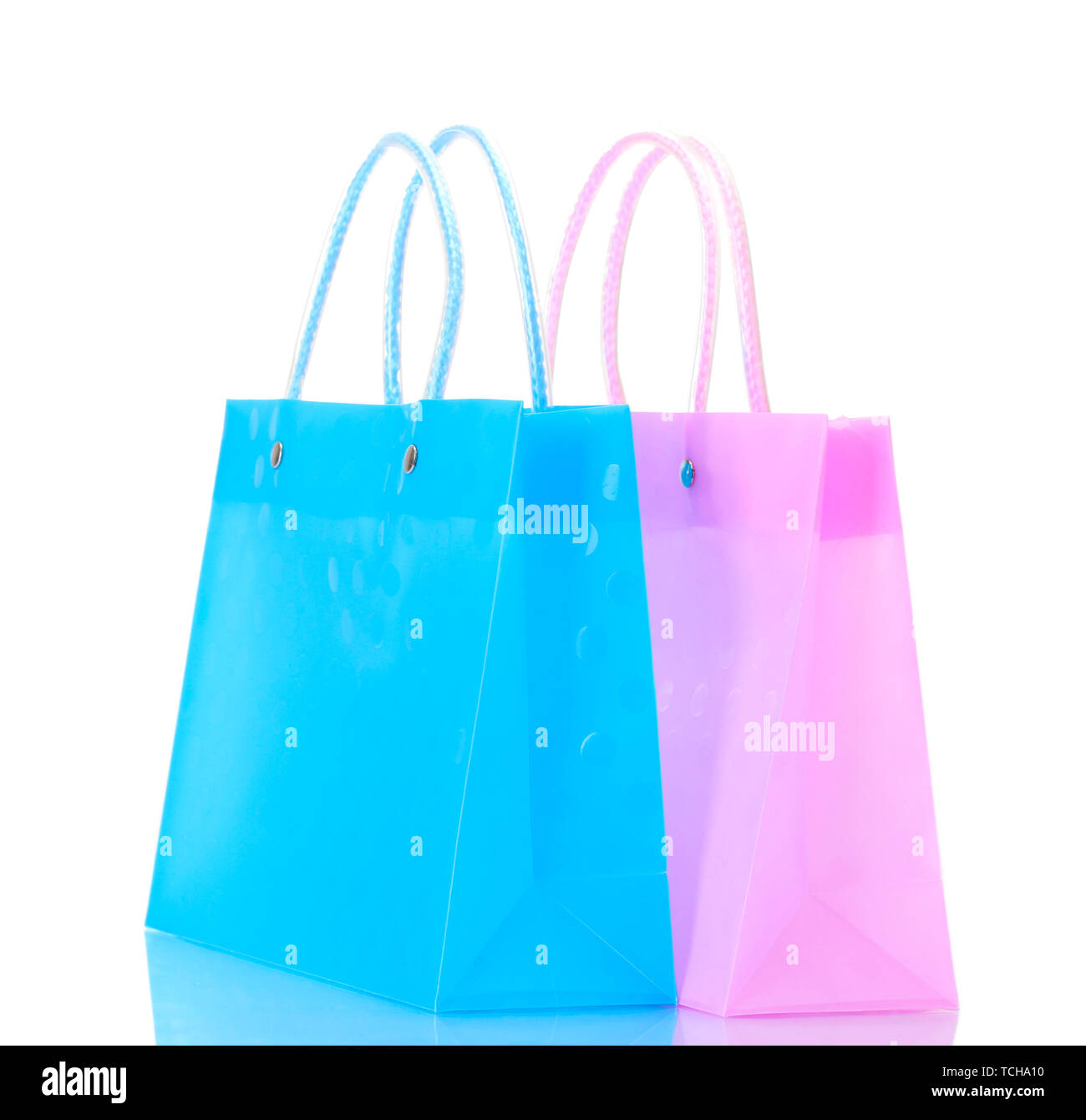 bright pink and blue shopping bags isolated on white Stock Photo - Alamy