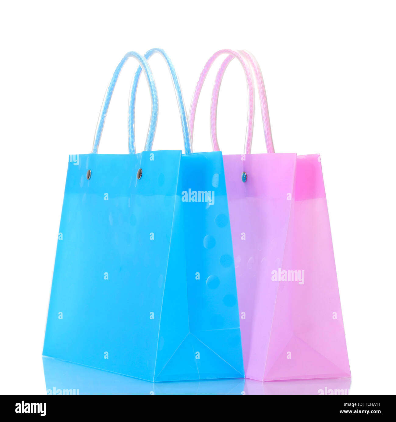 bright pink and blue shopping bags isolated on white Stock Photo - Alamy