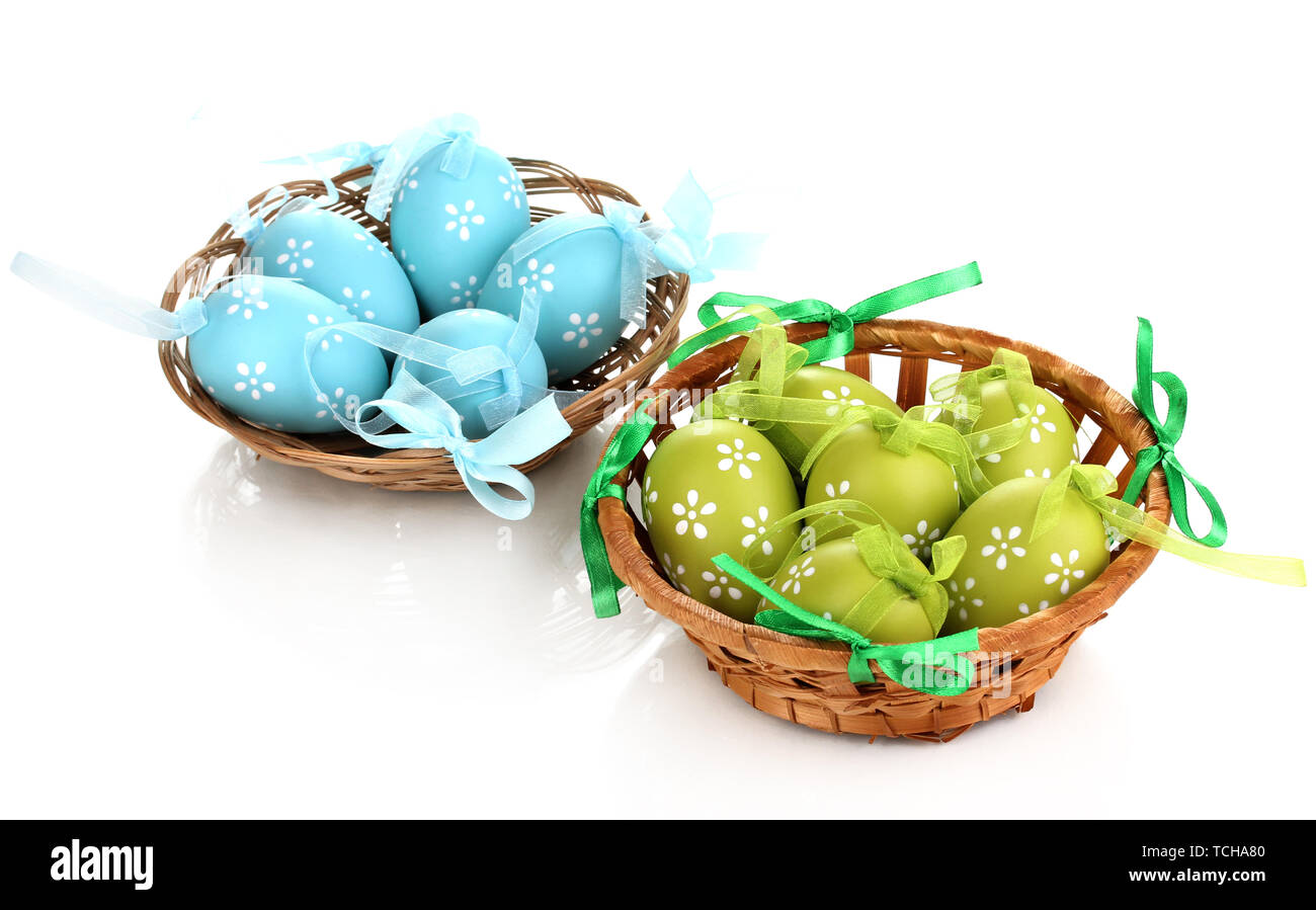 Colorful easter eggs in basket isolated on white Stock Photo - Alamy