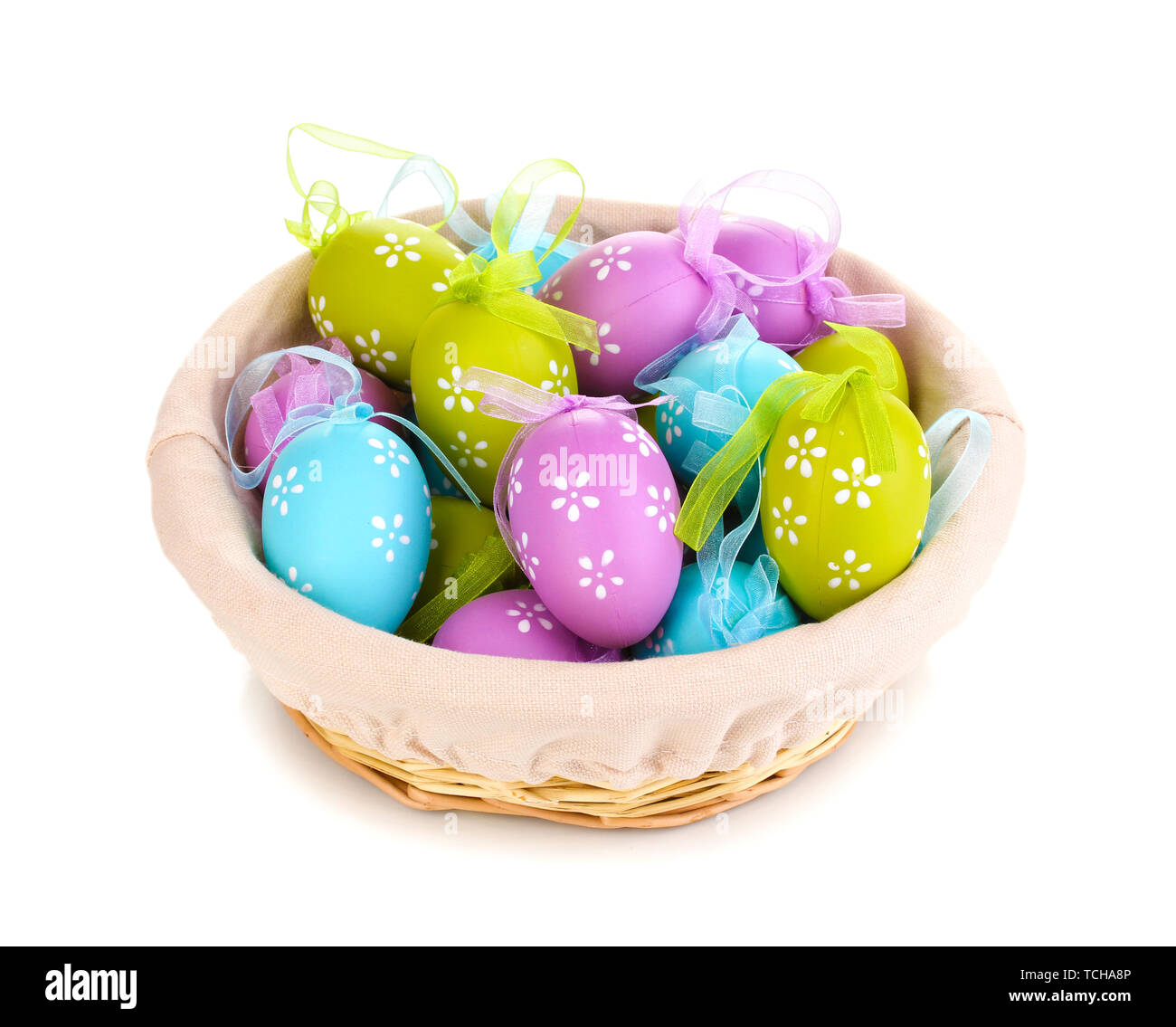 Colorful easter eggs in basket isolated on white Stock Photo - Alamy