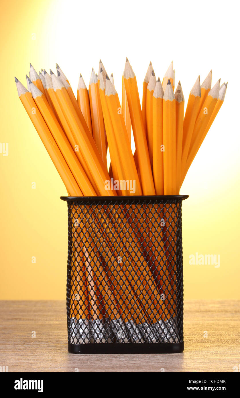 Black Wood Pencil On Yellow Background Stock Photo 1309916755