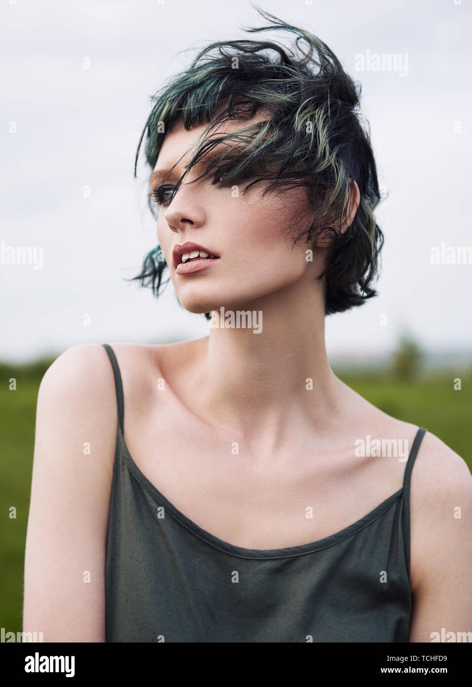 Outdoor portrait of the pretty young girl in field Stock Photo - Alamy